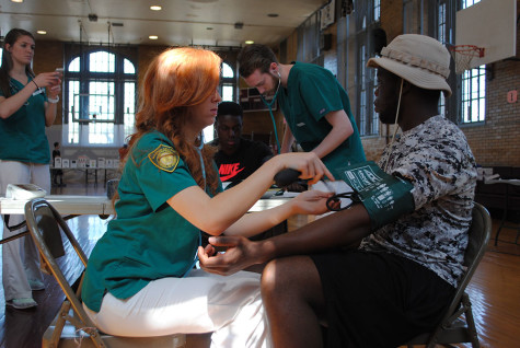 Daniel Bataforyen has his blood pressure checked.