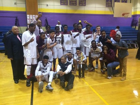 The team after their win with the trophy.