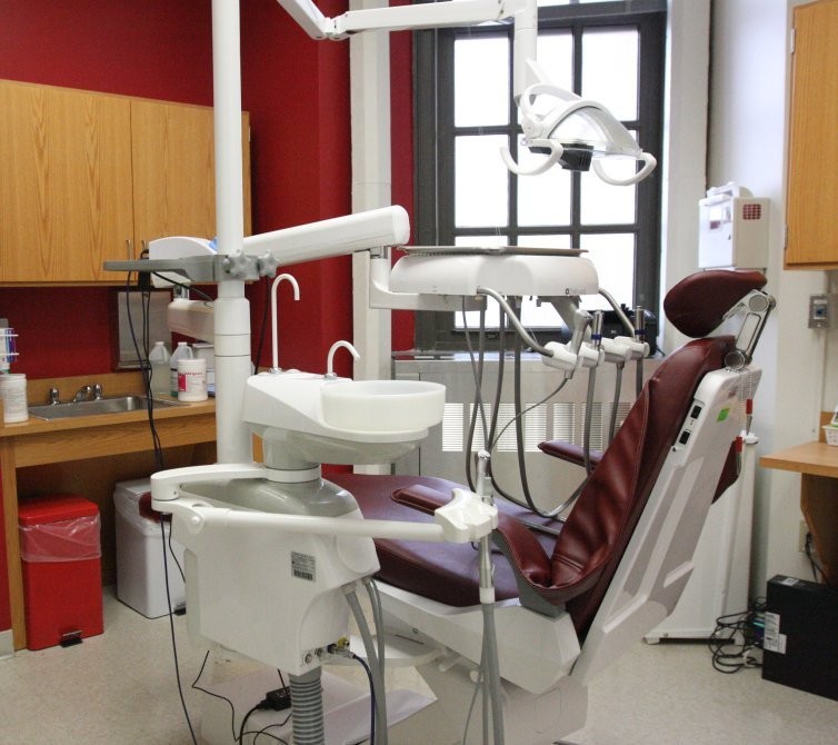 A room in the Health Center, decked out with a chair and its equipment