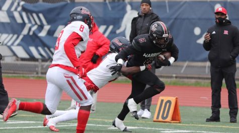 Curtis Victory Johnson looks for extra yardage on a run play against Erasmus Hall during Sundays PSAL City Conference championship game at Abraham Lincoln HS in Brooklyn. (Staten Island Advance)