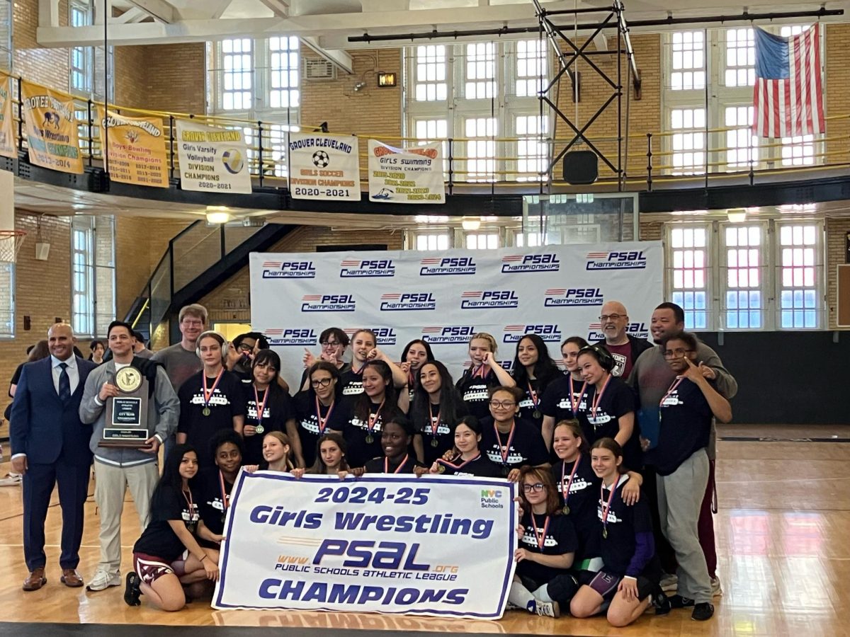The girls wrestling team after winning the championship.